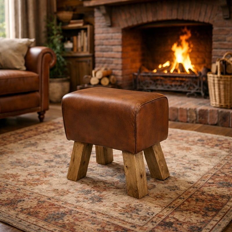 Vintage poef van leer.